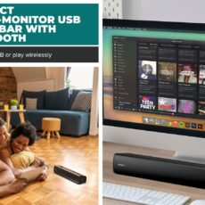 Głośnik Creative Stage Air V2 pod monitorem komputera z odtwarzaczem Spotify